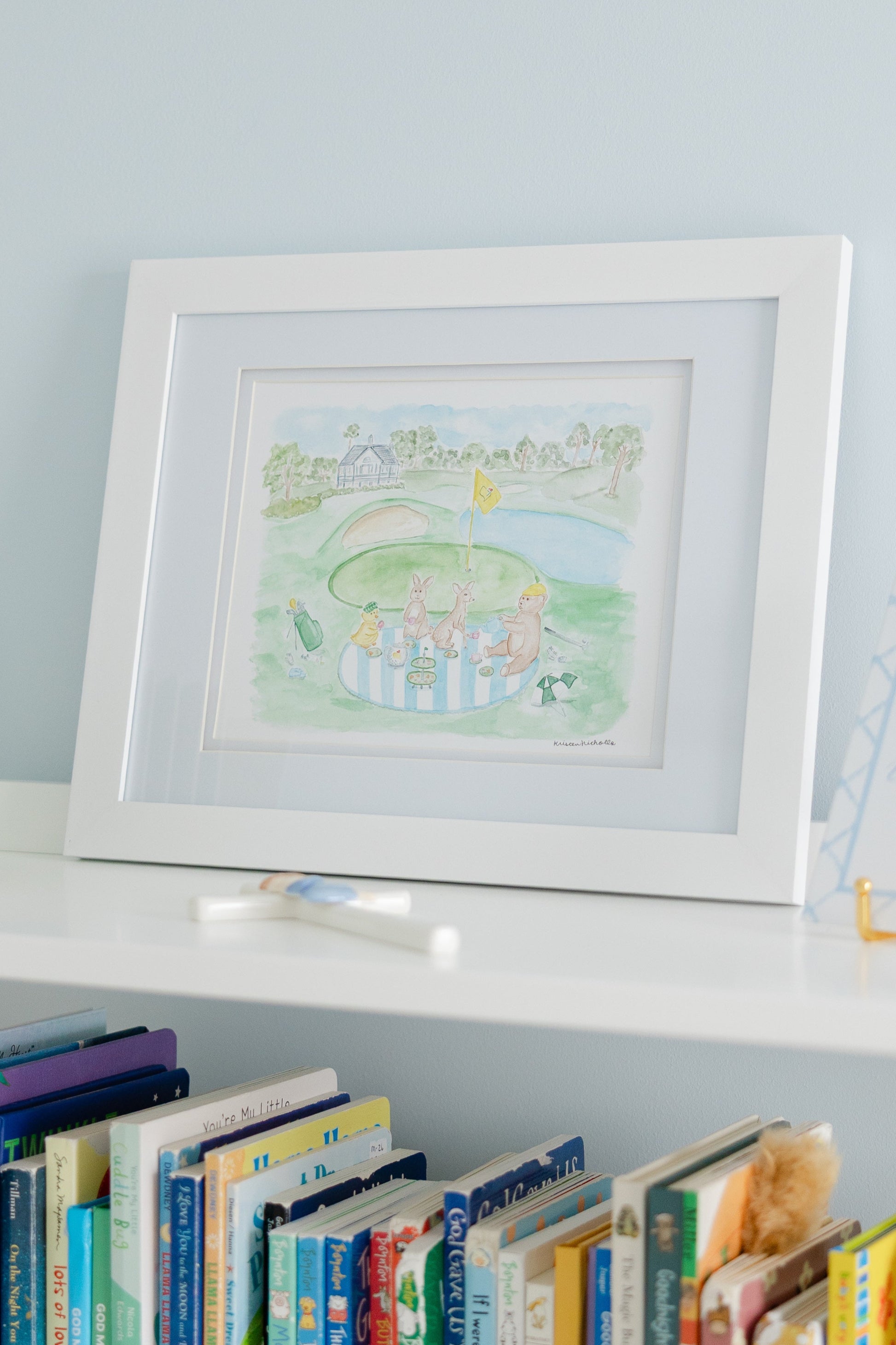 A watercolor art print depicting a whimsical scene with baby animals playing golf on a golf course. The print is in soft pastel colors.