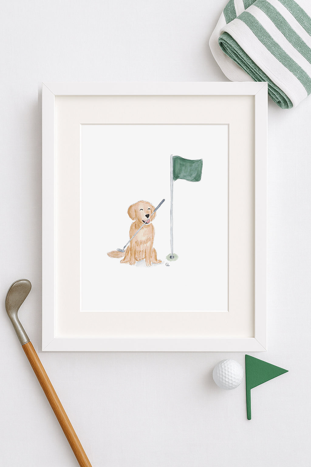 framed artwork of dog holding a golf club in its mouth sitting next to a golf flag